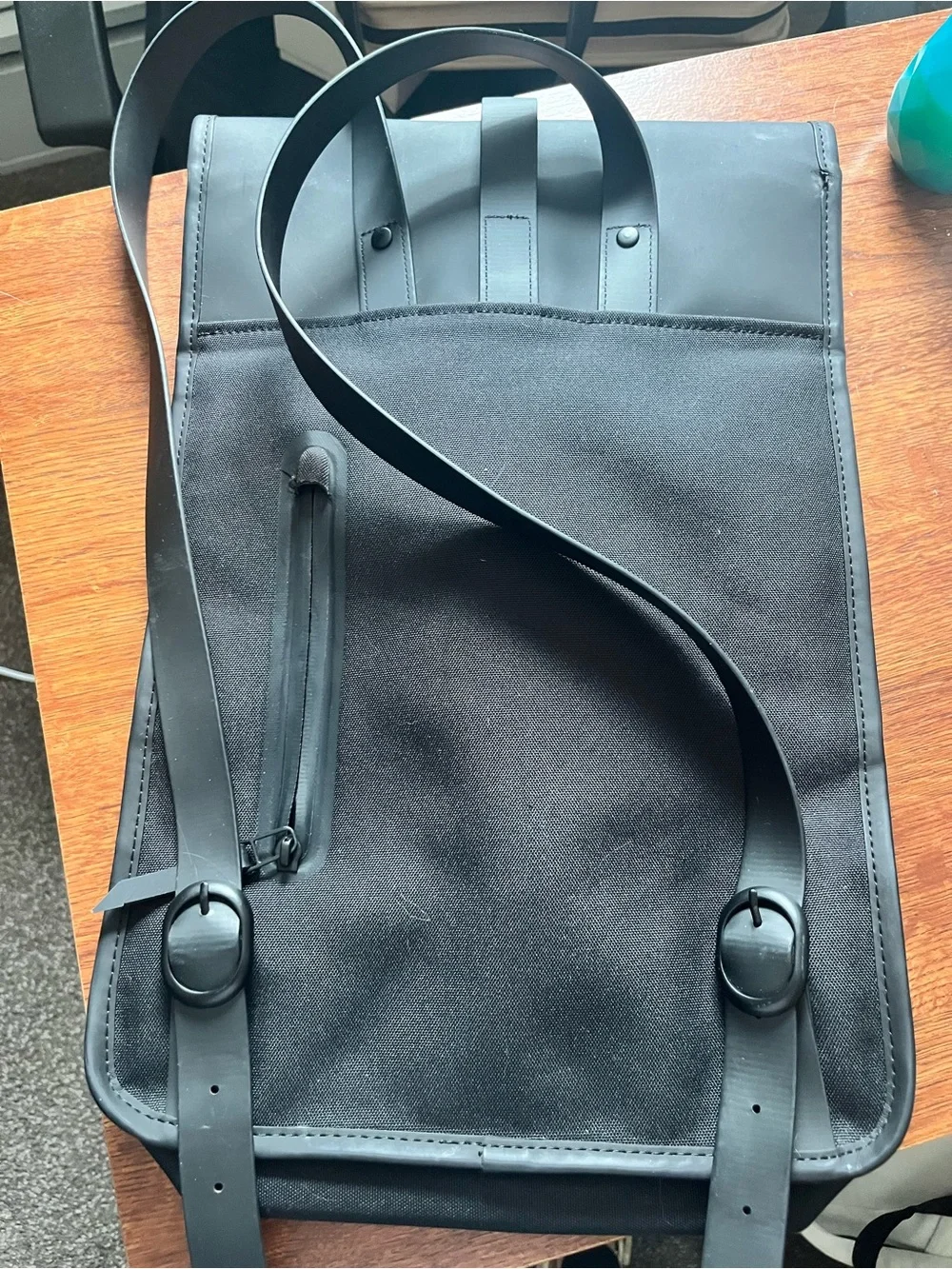 Rains Black Waterproof Roll-Top Backpack - Minimalist Design